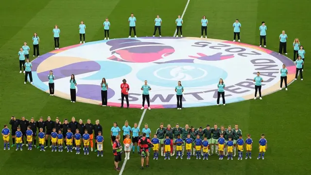 A general view as England and Italy players line up during the National Anthems