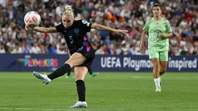 England's defender #05 Alex Greenwood takes a shot