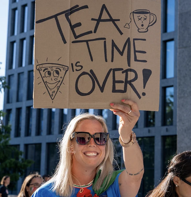 Fans of Italy hold up a sign