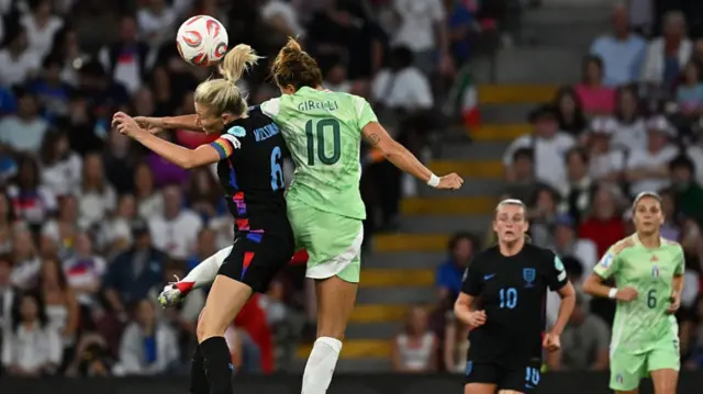England's defender #06 Leah Williamson (L) vies with Italy's forward #10 Cristiana Girelli during the UEFA Women's Euro 2025 semi-final football match between England and Italy at the Stade de Geneve in Geneva