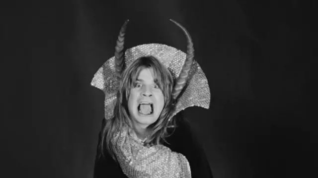 Ozzy Osbourne in fancy dress with horns