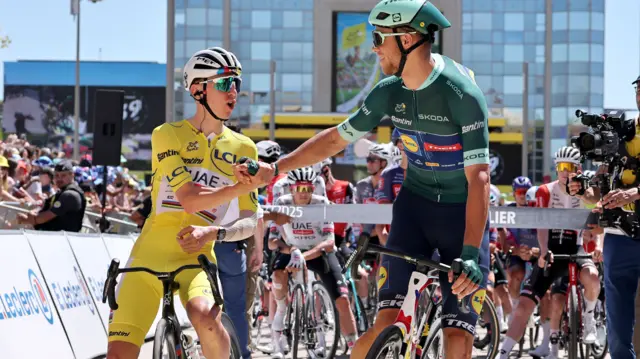 Tadej Pogacar and Jonathan Milan before stage 16 of the 2025 Tour de France
