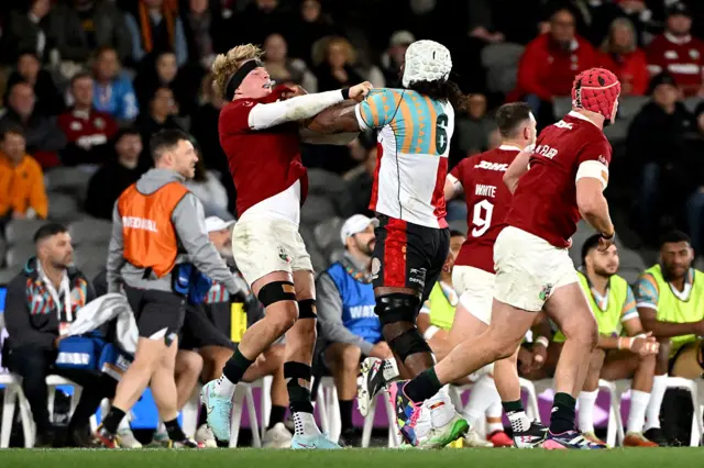 First Nations & Pasifika XV's Seru Uru (R) and British and Irish Lions' Henry Pollock scuffle