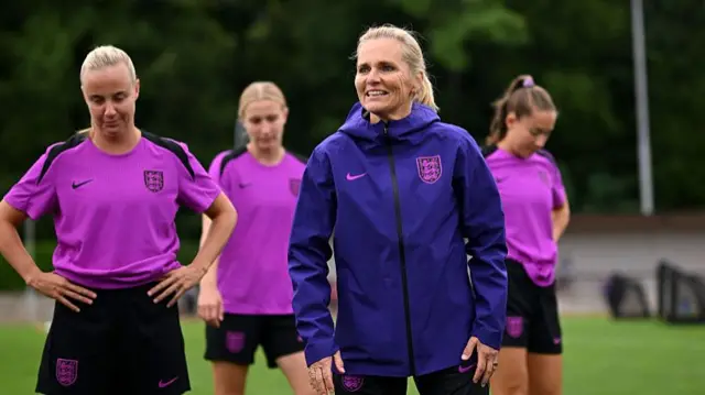 arina Wiegman, Head Coach of England, speaks to the players during a training session during the England UEFA Women's EURO 2025 Camp