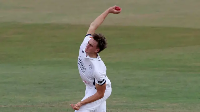 Eddie Jack bowling for Hampshire