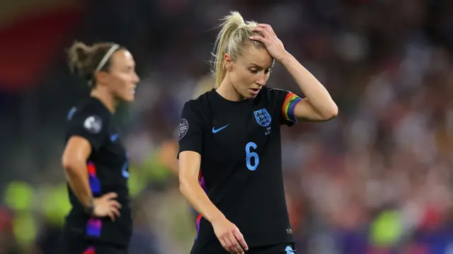Leah Williamson of England looks dejected