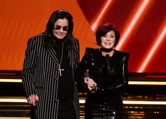 From left to right: Ozzy Osbourne and Sharon Osbourne speak onstage during the 62nd Annual GRAMMY Awards in 2020