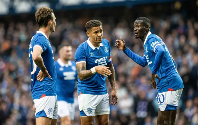 Rangers players in discussion in the first half