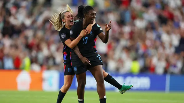 Michelle Agyemang of England celebrates scoring her team's first goal with teammate Ella Toone