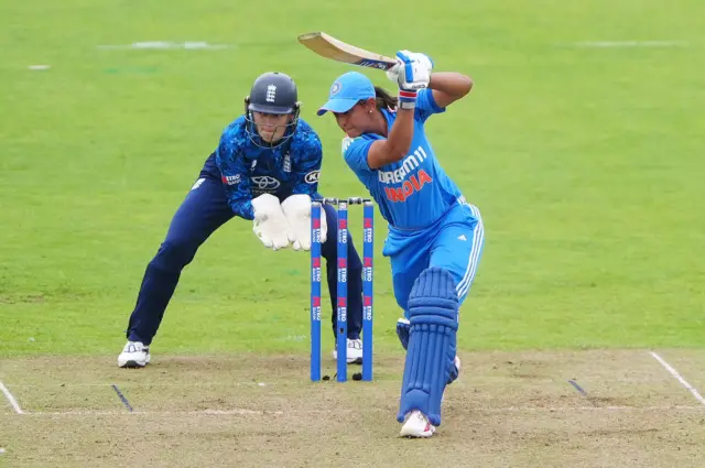 India's Harmanpreet Kaur hits a boundary