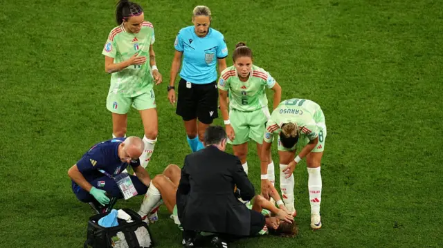 Cristiana Girelli of Italy goes down with an injury and is later substituted
