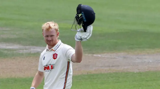 Jordan Cox acknowledges reaching his century for Essex at Sussex
