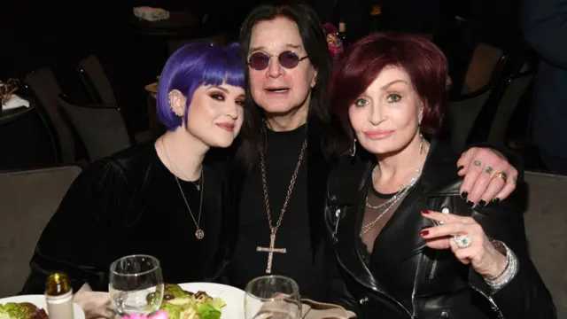 Kelly Osbourne, Ozzy Osbourne, and Sharon Osbourne pose for photo