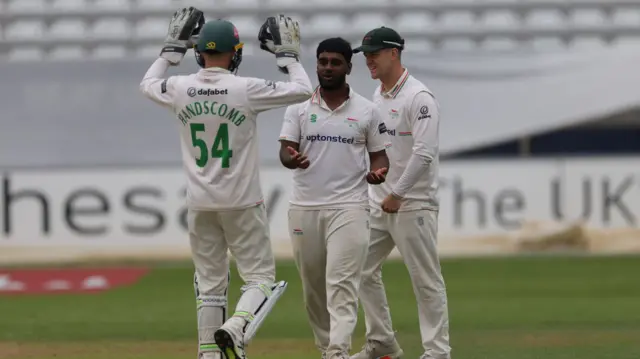 Peter handscomb and Rehan Ahmed celebrate