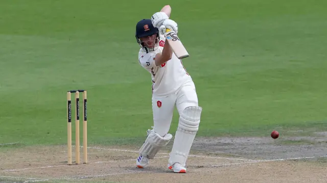 Jordan Cox hits a four for Essex
