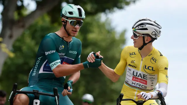 Jonathan Milan and Tadej Pogacar before stage 17 of the 2025 Tour de France