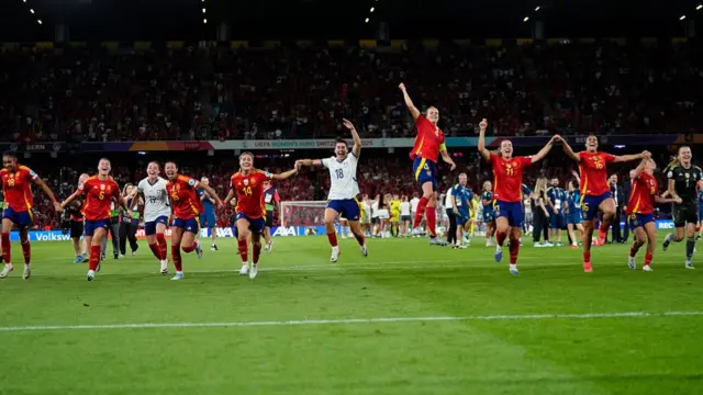 Spanish players celebrate victory