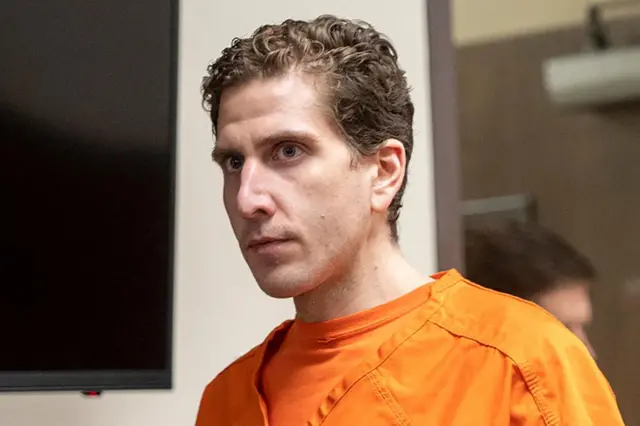 Bryan Kohberger enters the courtroom for his arraignment hearing in Latah County District Court in May 2023. He is wearing orange prison clothes.