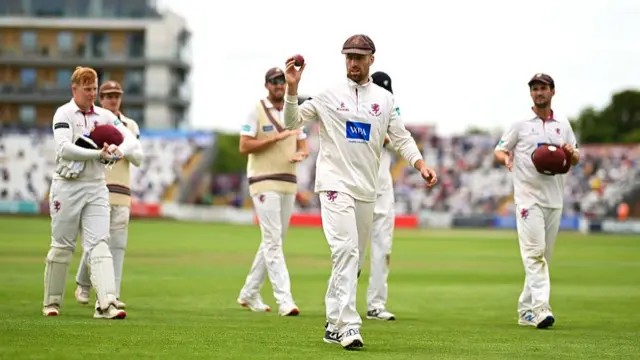 Jack Leach is applauded by team mates after taking six wickets for Somerset