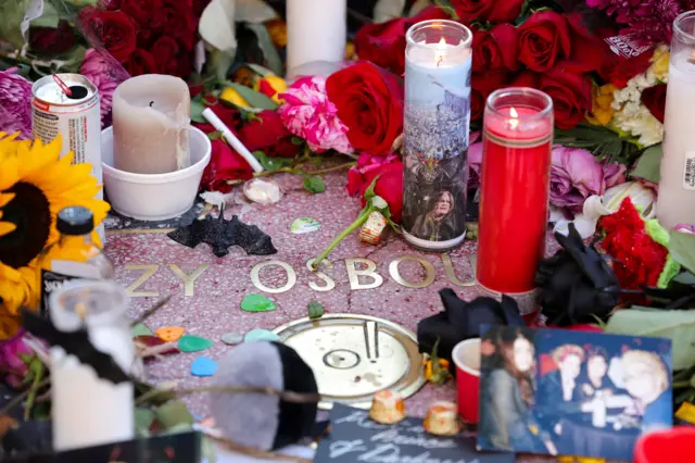 Candles and flowers on Ozzy's star