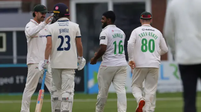 Leicestershire celebrate taking a wicket