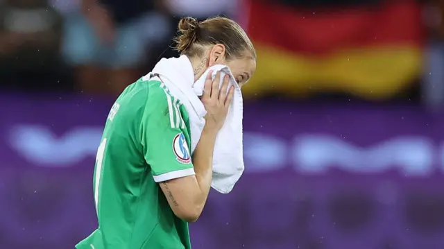 Ann-Katrin Berger of Germany looks dejected