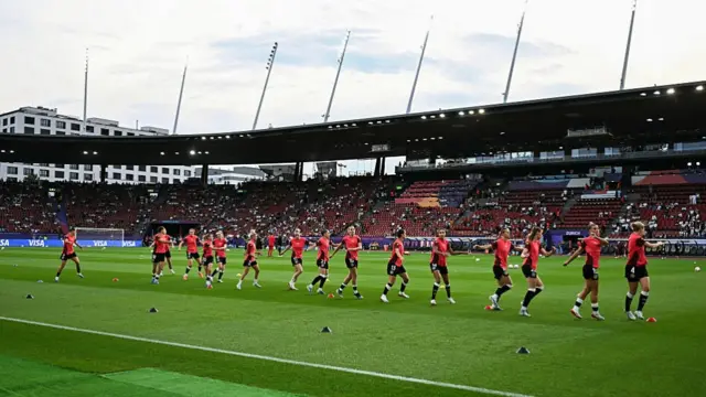 Germany's players warm up