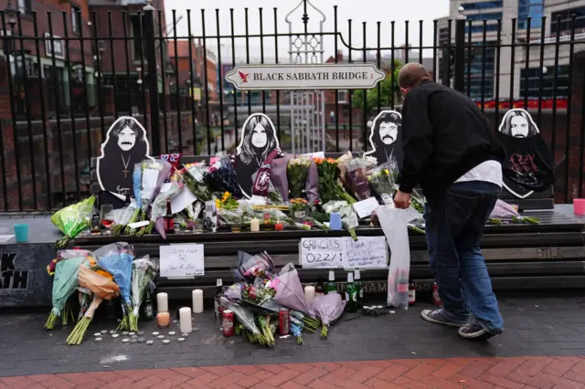 Flowers left at Sabbath bridge