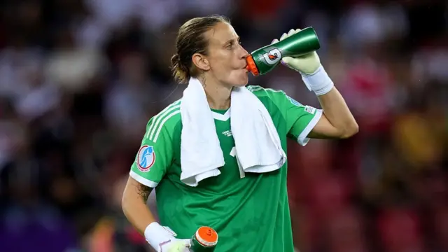 Ann-Katrin Berger of Germany takes a drink