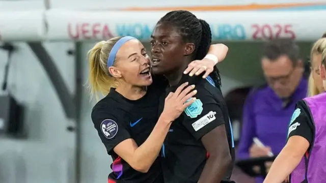 Chloe Kelly celebrates with Michelle Agyemang