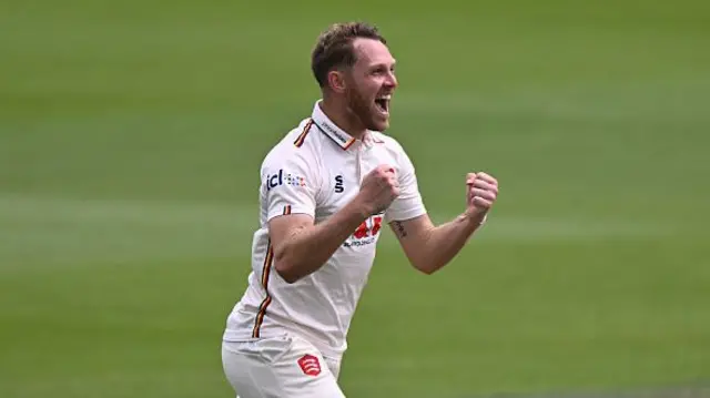 Jamie Porter celebrates taking a wicket for Essex at Sussex