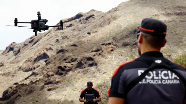 Authorities carry out a drone search in the Los Carrizales ravine, on the island of Tenerife, Spain.