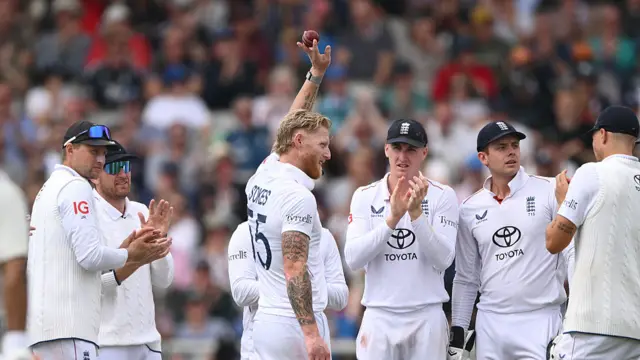 Ben Stokes being applauded by the England team