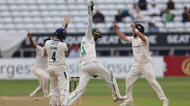 Leicestershire celebrate a Rehan Ahmed wicket