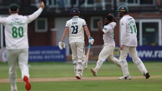 Leicestershire celebrate the wicket of Caleb Jewell