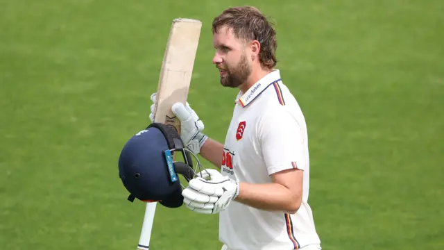 Matt Critchley acknowledges the crowd as he leaves the field at Hove