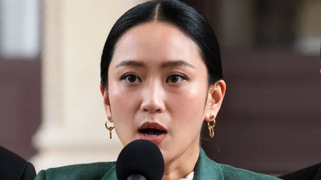 Thai Prime Minister Paetongtarn Shinawatra speaks to reporters after the Constitutional Court suspends her from duty at Government House