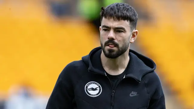 Eiran Cashin of Brighton & Hove Albion inspects the pitch prior to the Premier League match between Wolves and Brighton & Hove Albion FC at Molineux