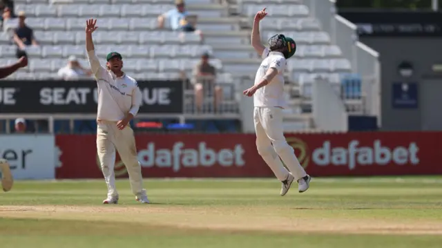 Leicestershire celebrate taking a wicket against Derbyshire