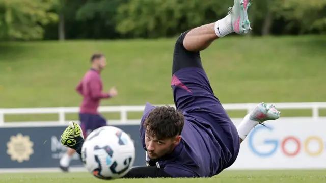 James Trafford attempts a save