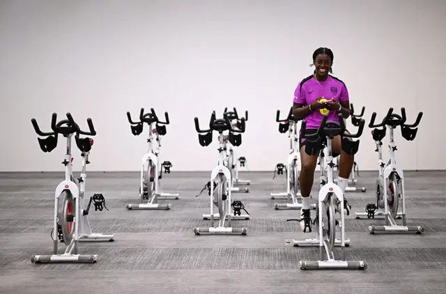 Michelle Agyemang on an exercise bike at England camp