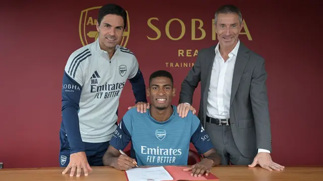 Arsenal manager Mikel Arteta with (2ndL) new signing Cristhian Mosquera and (R) Sporting Director Andrea Berta at Sobha Realty Training Centre