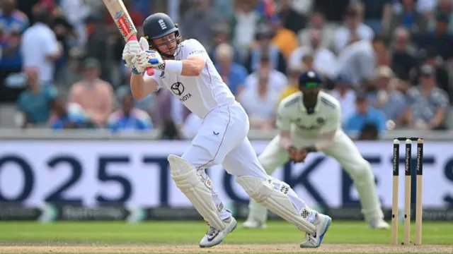 Ollie Pope runs with the bat vs India at Old Trafford.