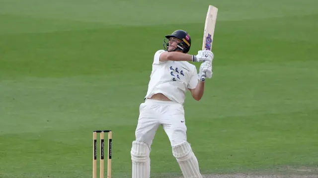 James Coles hits a boundary for Sussex