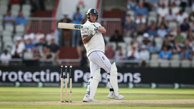 Ben Stokes watches his ball after batting v India at Old Trafford.
