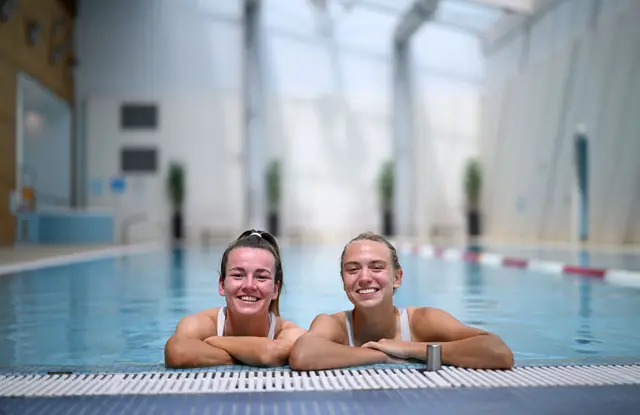Lauren Hemp and Esme Morgan in swimming pool