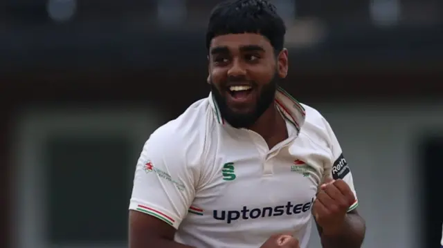 A smiling Rehan Ahmed