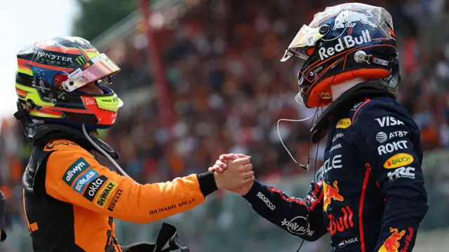 Piastri and Verstappen shake hands after the sprint race in Spa.