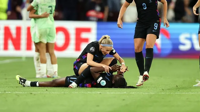 Chloe Kelly and Michelle Agyemang of England celebrate a victory