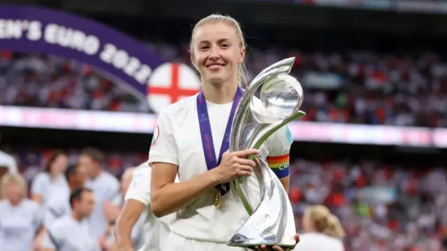 Leah Williamson of England celebrates with the trophy following her teams victory during the UEFA Women's Euro 2022 final match between England and Germany at Wembley Stadium